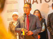 Pj Heru Dorong 70 Persen Transportasi Umum People Near Transit di Jakarta