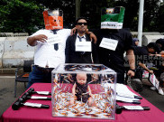 Aksi Teaterikal Peringati Hari Kesehatan Nasional Desak Pengendalian Tembakau di Jakarta