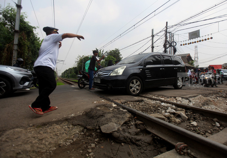 PT KAI Tutup 316 Perlintasan Sebidang Sepanjang 2025, Masyarakat Diminta Berhenti 'Adu Nasib' dengan Kereta Api