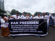 Aksi Unjuk Rasa Dosen ASN Tuntut Pembayaran Tukin di Patung Kuda Jakarta 