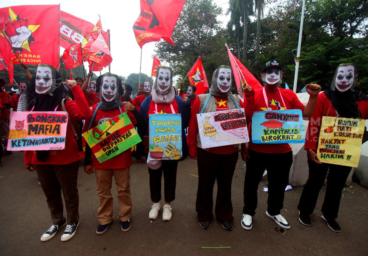 Upah Minimum, Perjanjian Kerja Waktu Tertentu, Outsourcing, Cuti dan Pesangon Masih Jadi Masalah Bagi Buruh di Indonesia