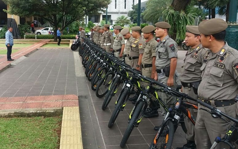 Ilustrasi: Para anggota satpol PP DKI Jakarta (Foto: @satpolppdki)