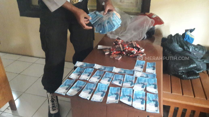 Beli Kopi Sasetan, Pengedar Uang Palsu Rp 50 Ribuan Digiring Warga
