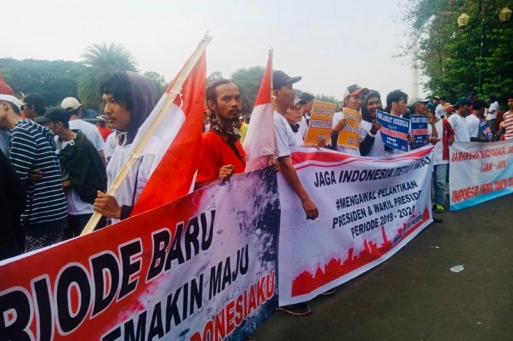 Masyarakat Penegak Demokrasi beraksi damai untuk menyerukan kawal pelantikan presiden dan wakil presiden, di Patung Kuda, Jakarta Pusat, Kamis (10/10/2019). ANTARA/Taufik Ridwan