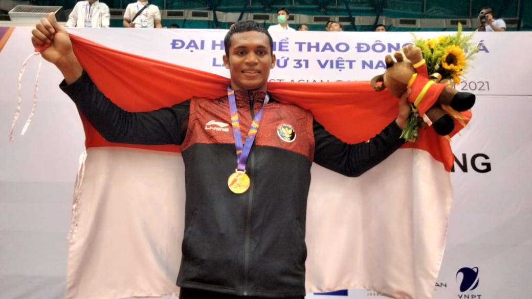 Petinju Indonesia  Mikhael Roberd Muskita meraih medali emas di kelas 75-81kg putra SEA Games 2021 Vietnam yang digelar di Bac Ninh Gymnasium, Minggu (22/5). (Tennis Indonesia/Dwi Ari Setyadi)