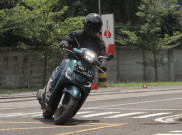 Perhatikan Hal Berikut Saat Riding di Jalan Aspal Berkerikil