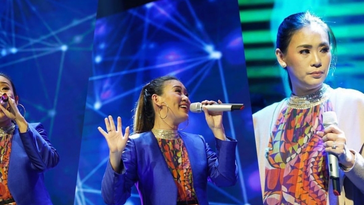 Helena bernyanyi di sebuah konser musik. (Foto: Instagram/@helena_iyung)