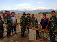 Prajurit TNI Temukan Uang Rp1 Miliar di Reruntuhan Gempa Sulteng
