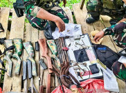 Marinir Satgas Pengamanan Perbatasan RI-PNG Sita Senjata Diduga Milik KKB Yahukimo