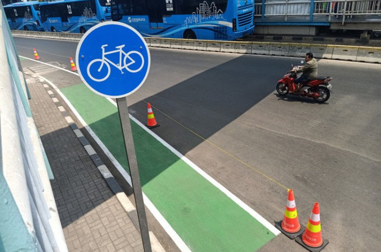 Aturan Baru Bersepeda di Jalan, Dilarang Berboncengan dan Pakai Payung