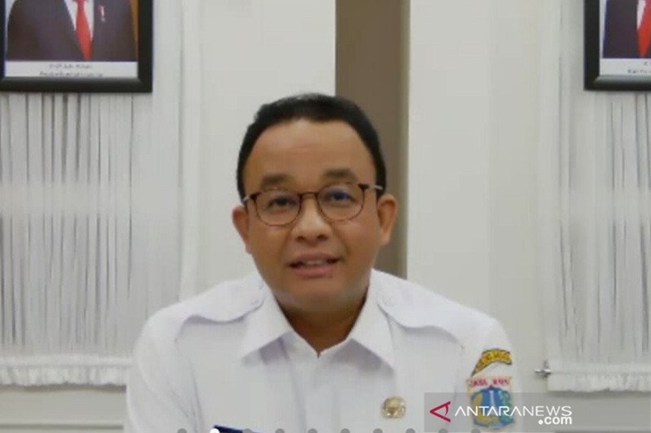 Tangkapan layar Gubernur DKI Jakarta Anies Baswedan memberikan sambutan dalam diskusi virtual "Optimalisasi Kredit Usaha Mikro Untuk Pulihkan Ekonomi Jakarta", Rabu (22/7/2020) (ANTARA/Livia Kristianti)