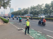 Polisi Lalu Lintas Disebar Buat Urai Kemacetan di Jalan Jenderal Gatot Subroto Menuju Kawasan Gedung MPR/DPR/DPD