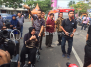 Risma Pantau Jalan Ambles dengan Pesawat Nirawak