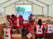 PMI Mulai Kirim Bantuan Alat Berat dan Peralatan Kebersihan ke Daerah Bencana Sumatera