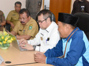Polda Riau Didesak Tangkap Plt Bupati Bengkalis