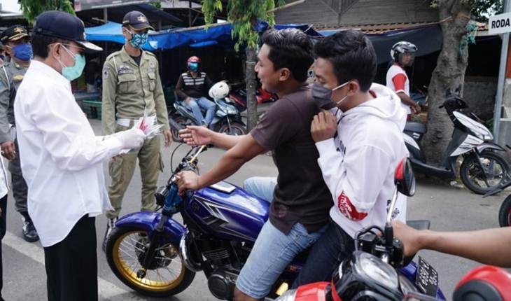Orang yang Tak Pakai Masker di Tempat Umum Kini Dianggap Aneh