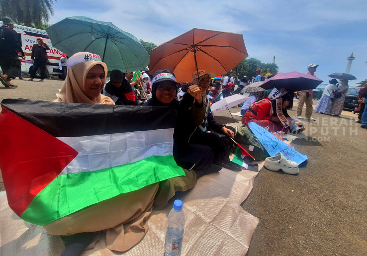 Aksi Solidaritas untuk Rakyat Palestina di Patung Kuda Monas Jakarta