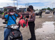 [HOAKS atau FAKTA]: Tidak Memakai Masker, Pengendara Motor dan Mobil Didenda Rp5 Juta