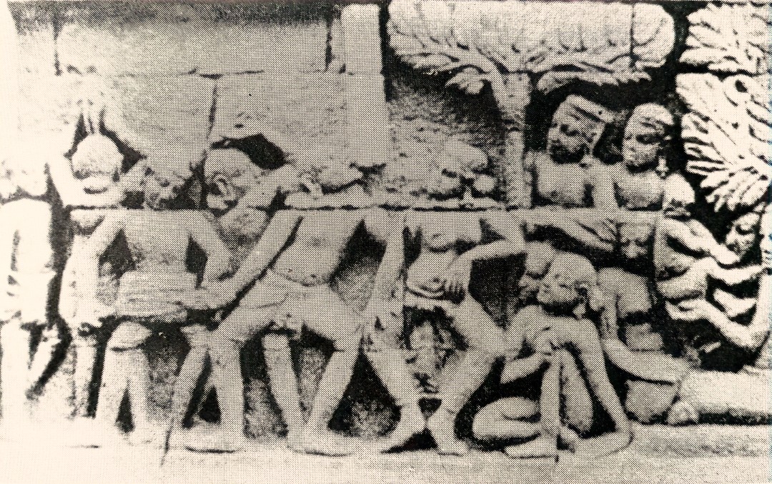 Pemain akrobat dalam relief Candi Borobudur