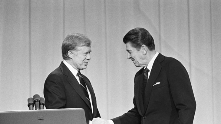 Jimmy Carter dan Ronald Reagan pada 1980. (MADELINE DREXLER/AP)