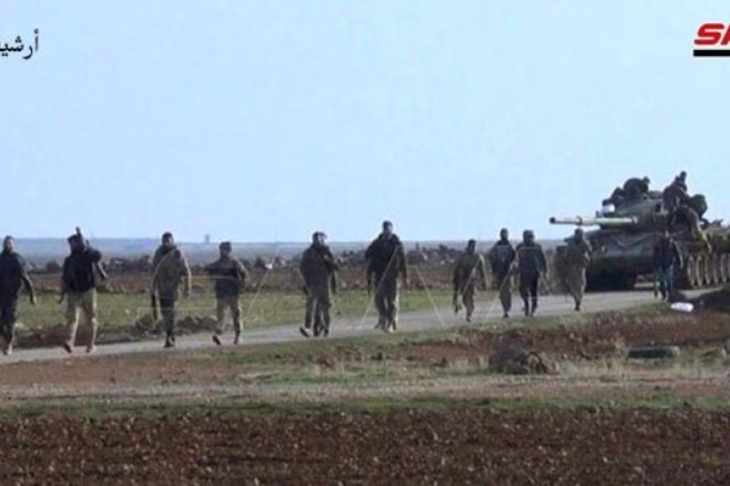 Fail Foto: Di dalam fail foto ini terlihat tentara Suriah bergerak menuju medan tempur (SANA Agency)