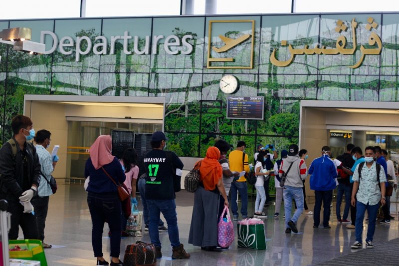 Pemulangan pekerja migran. (Foto: Antara)