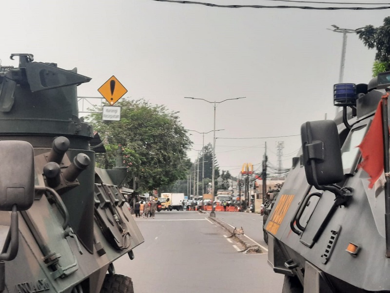Penyekatan mobilitas warga. (Foto: Antara)