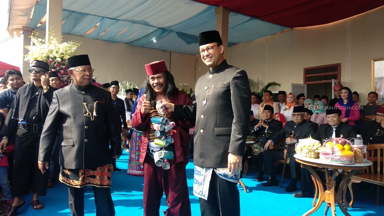 Hadiri Lebaran Betawi di Monas, Anies Disambut Atraksi Palang Pintu