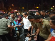  Berlibur Bersama Keluarga di Mal Solo, Jokowi Bagi-Bagi Kaos Bergambar Wajahnya