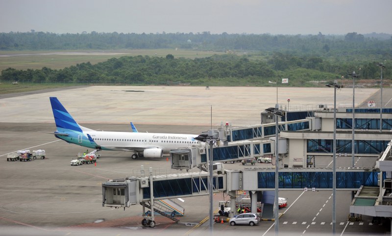 Pesawat maskapai Garuda Indonesia di Bandara Internasional Minangkabau (BIM), Padangpariaman, Sumatera Barat, Rabu (29/5). (ANTARA FOTO/Iggoy el Fitra)