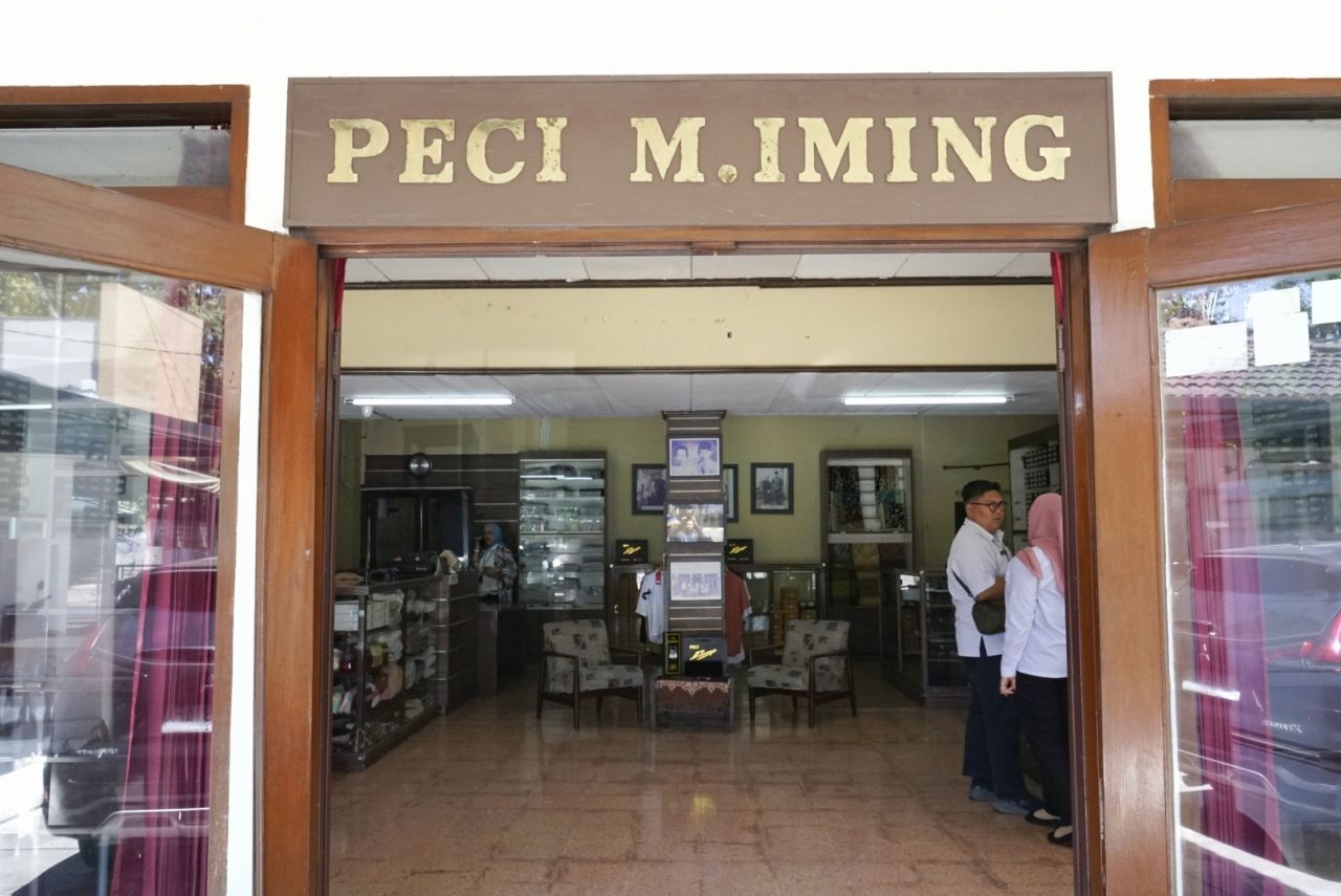 peci M Iming