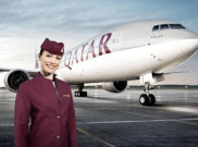 Layani Penumpang, Awak Kabin Qatar Airways Kenakan APD Lengkap