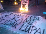 Mengenang Perjuangan Aktivis Munir, Mahasiswa UNS Nyalakan Ratusan Lilin
