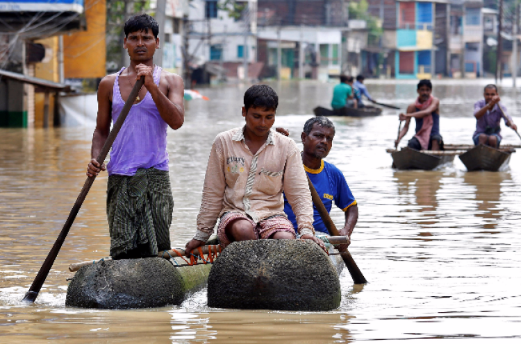 Banjir dan Longsor Akibat Hujan Lebat Tewaskan 30 Orang