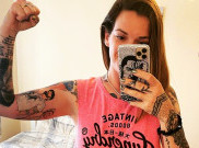 Seorang Perempuan Cetak Rekor Dunia dengan Tato Eminem Terbanyak di Tubuhnya