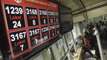 Mengejar Legalitas di Negeri Jiran