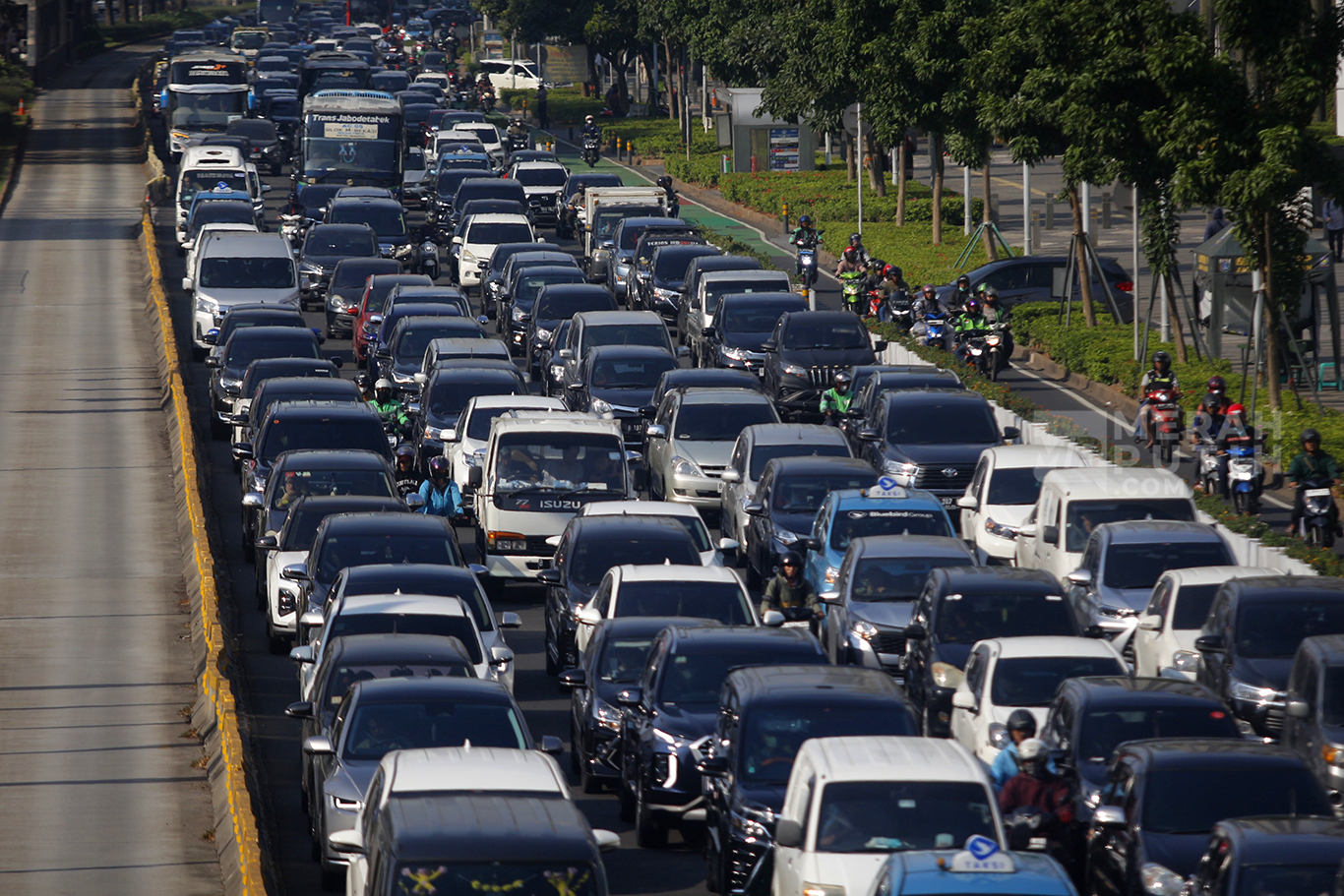 Jokowi: Pemerintah Belum Bahas Program Asuransi Wajib Kendaraan Bermotor
