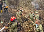 Menlu RI: Warga Sumatra dan Kalimantan Jadi Korban Pertama Kabut Asap Karhutla