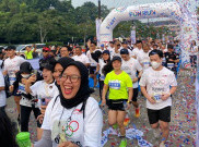 Peserta Penuh Senyum Ikuti Olympic Day NOC Indonesia Fun Run 2022