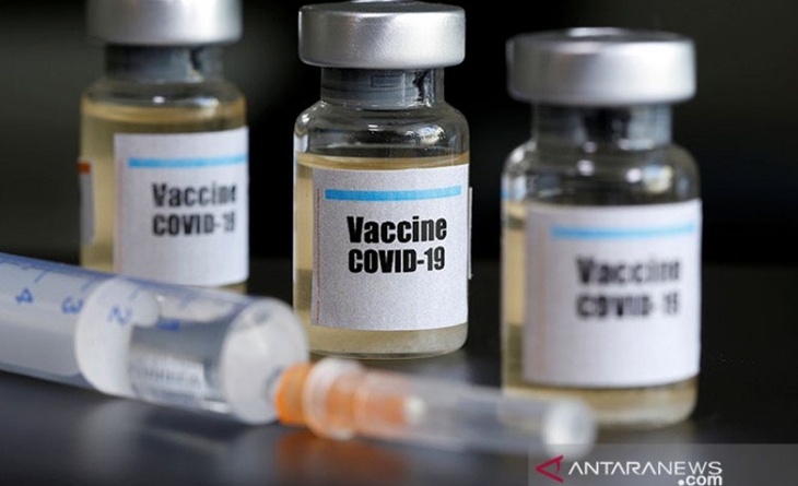 Dokumentasi - Botol kecil berlabel stiker "Vaksin COVID-19" dan jarum suntik medis, terlihat dalam ilustrasi yang diambil pada (10/4/2020). ANTARA/REUTERS/Dado Ruvic/pri.